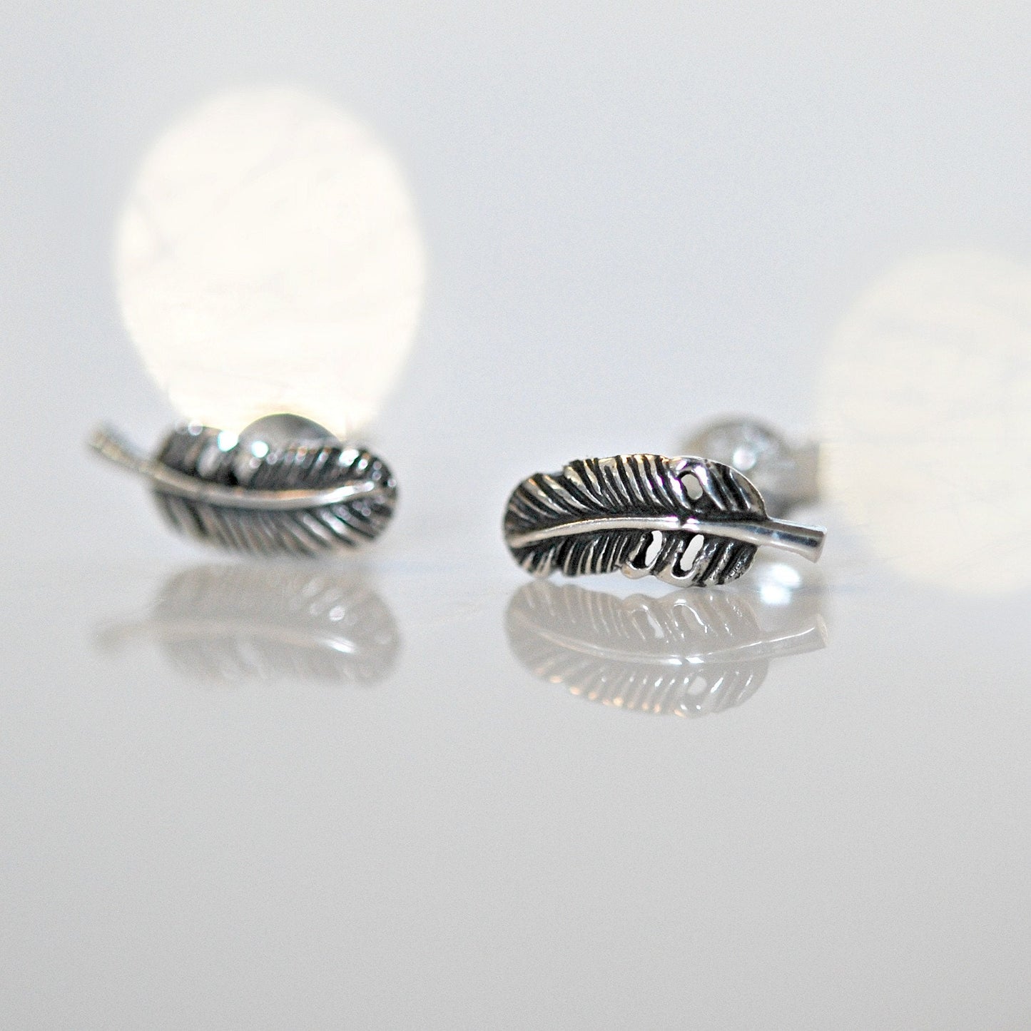Alison feather stud earrings