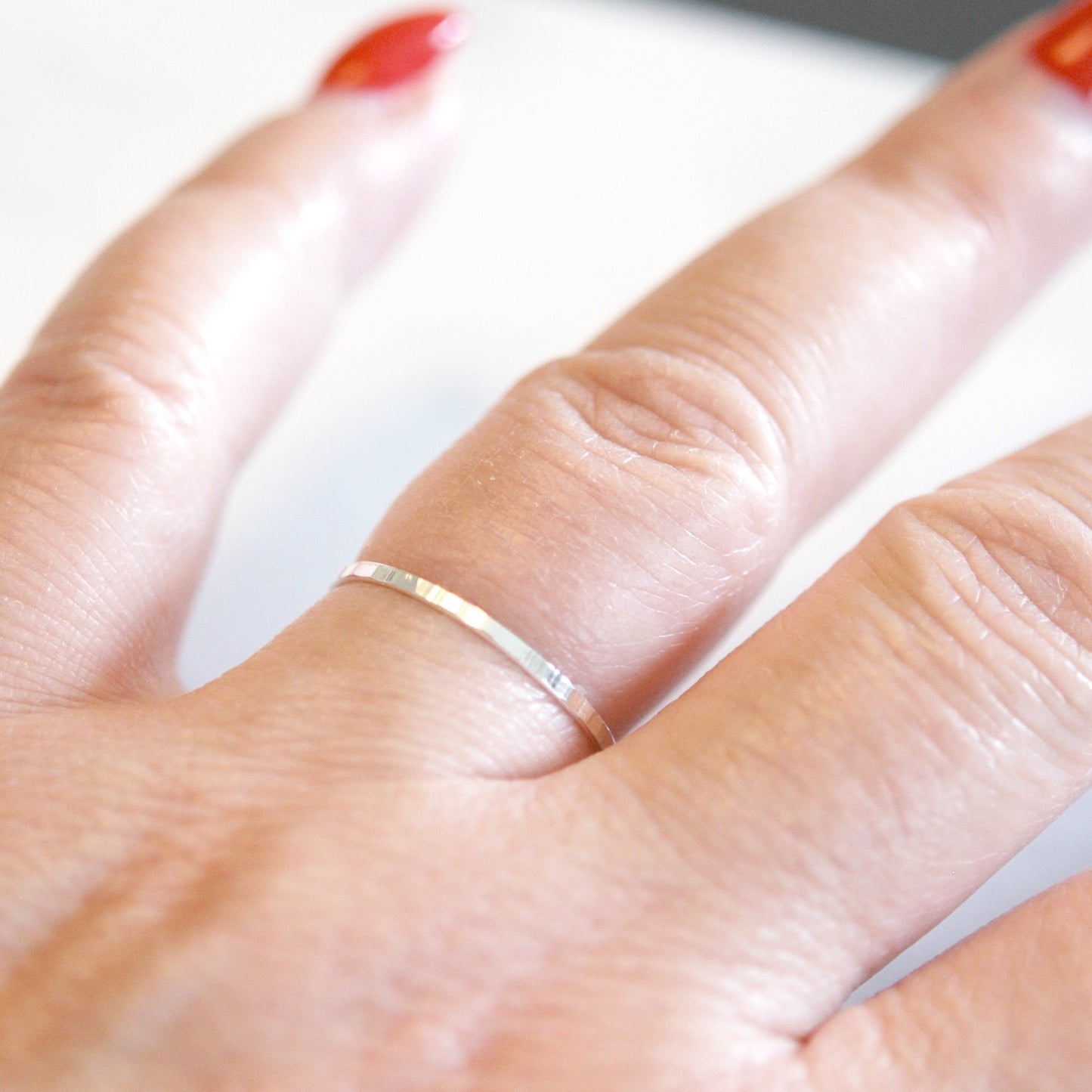 Ultra thin sterling silver hammered band ring