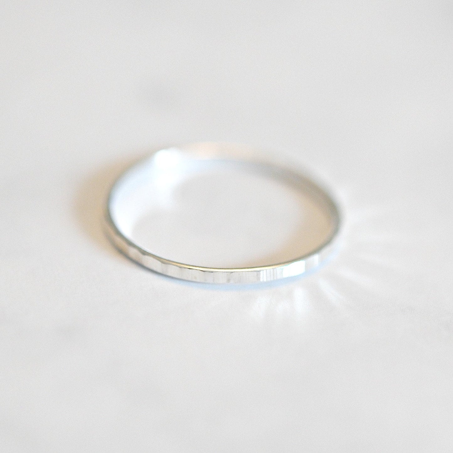 Ultra thin sterling silver hammered band ring