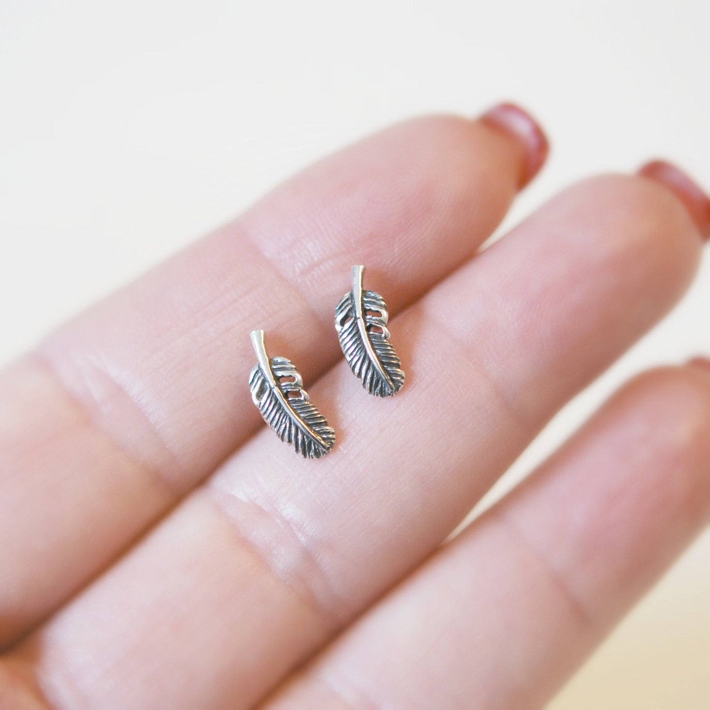 Alison feather stud earrings