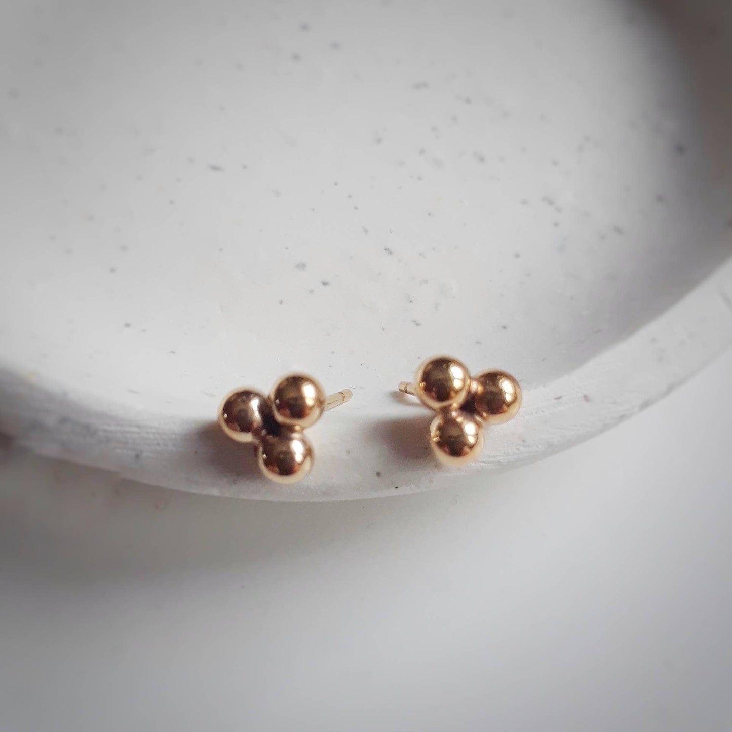 Maika gold triple ball stud earrings