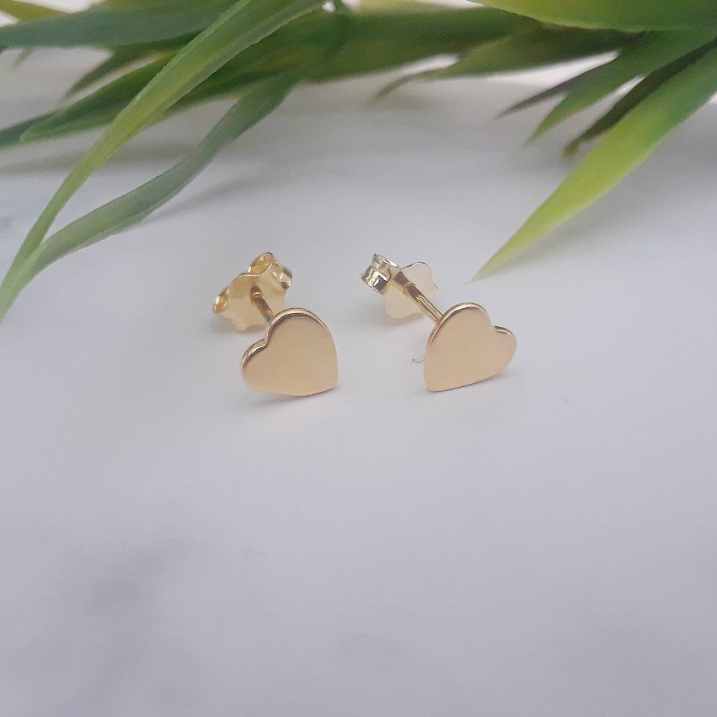 Tiny heart stud earrings
