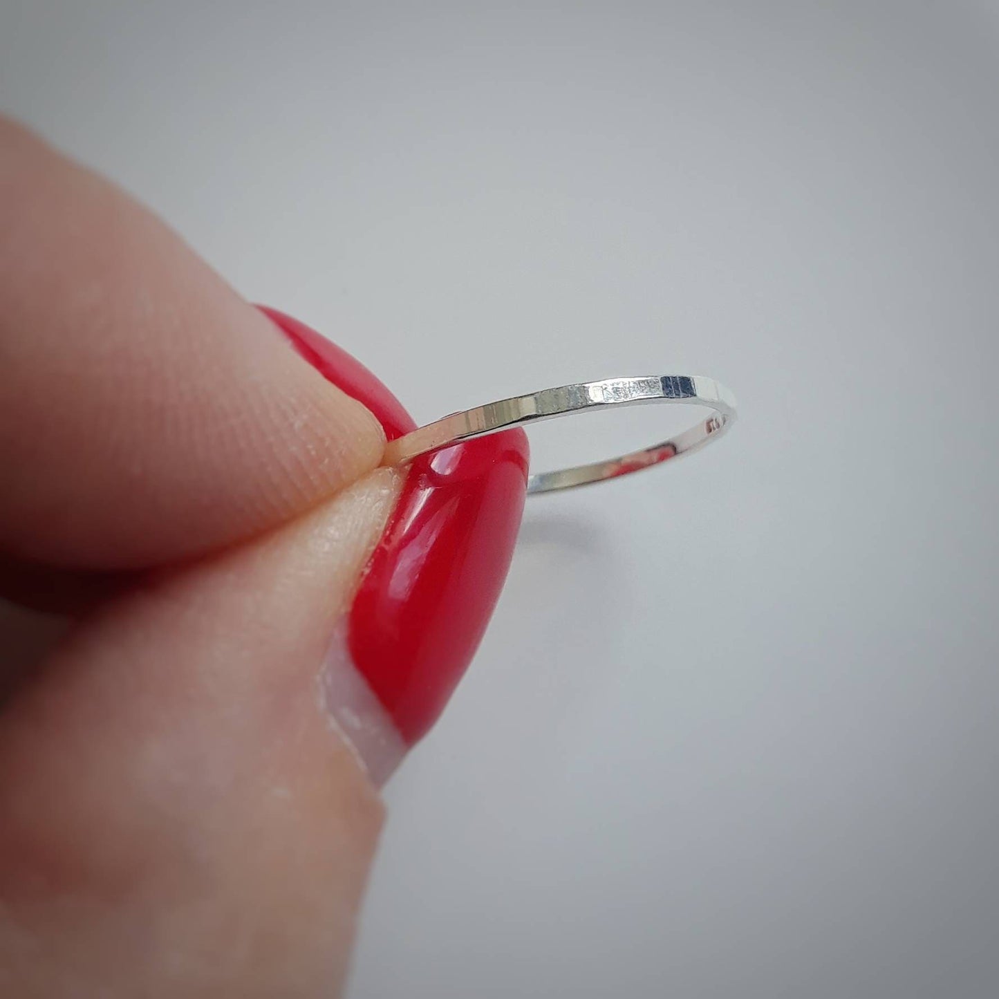 Ultra thin sterling silver hammered band ring