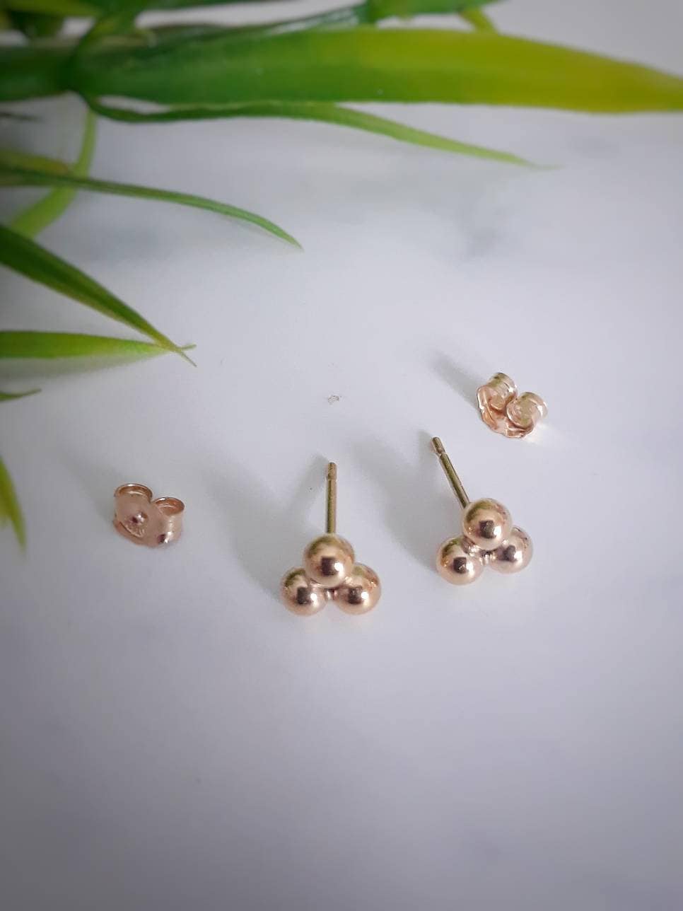 Maika gold triple ball stud earrings