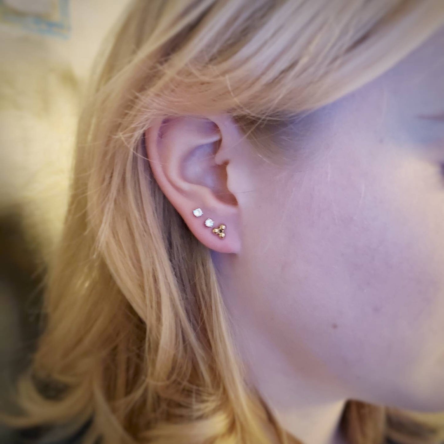 Maika gold triple ball stud earrings