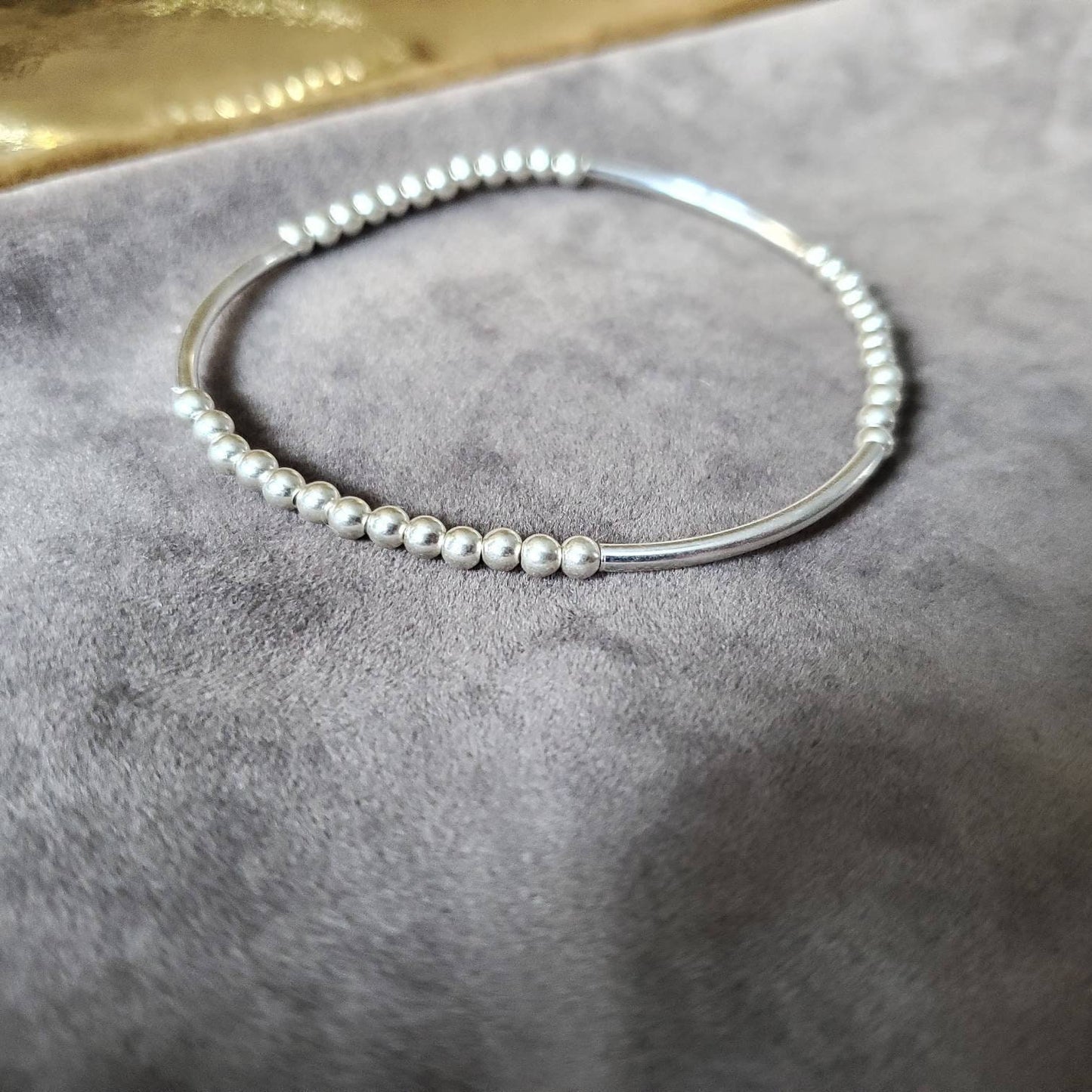 Sterling silver ball and tube bracelet