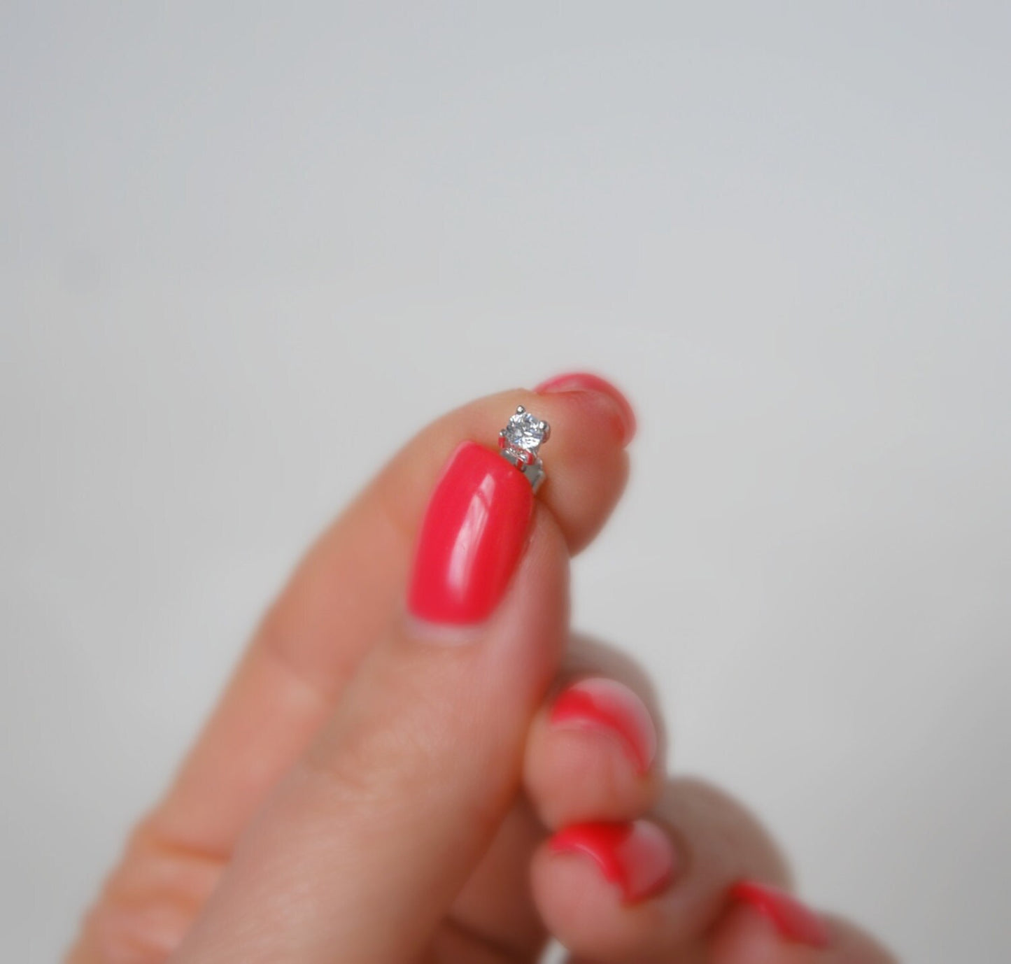 Tiny diamond stud earrings