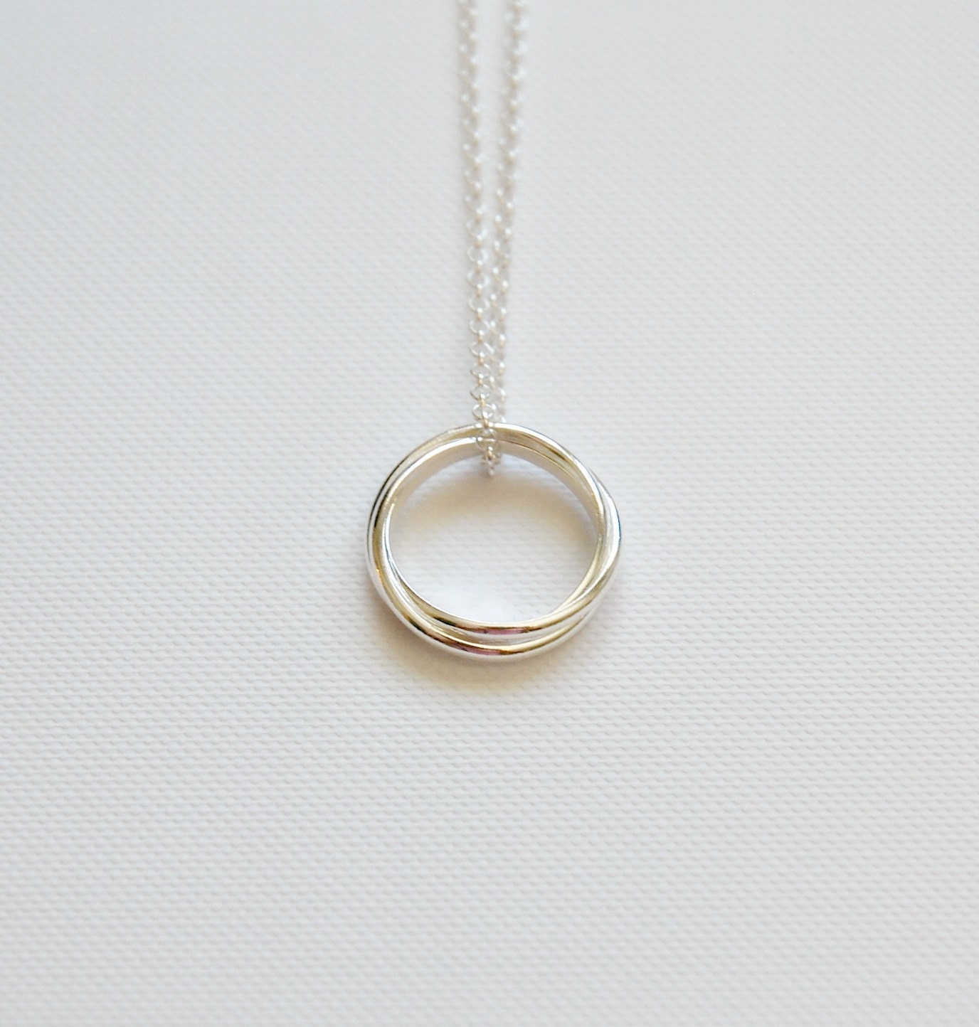 Sterling silver interlocking circle necklace, three circle necklace, nesting circles, entwined eternity rings, past present future