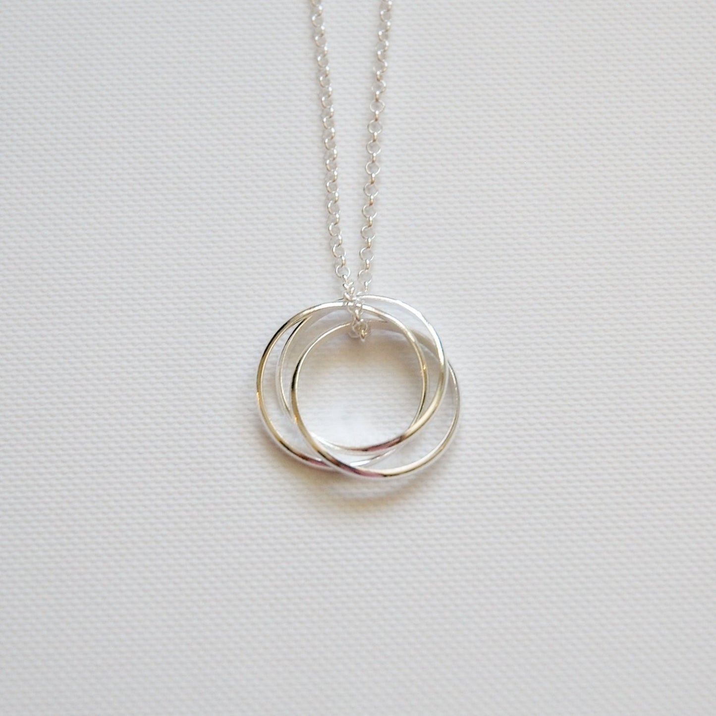 Sterling silver interlocking circle necklace, three circle necklace, nesting circles, entwined eternity rings, past present future