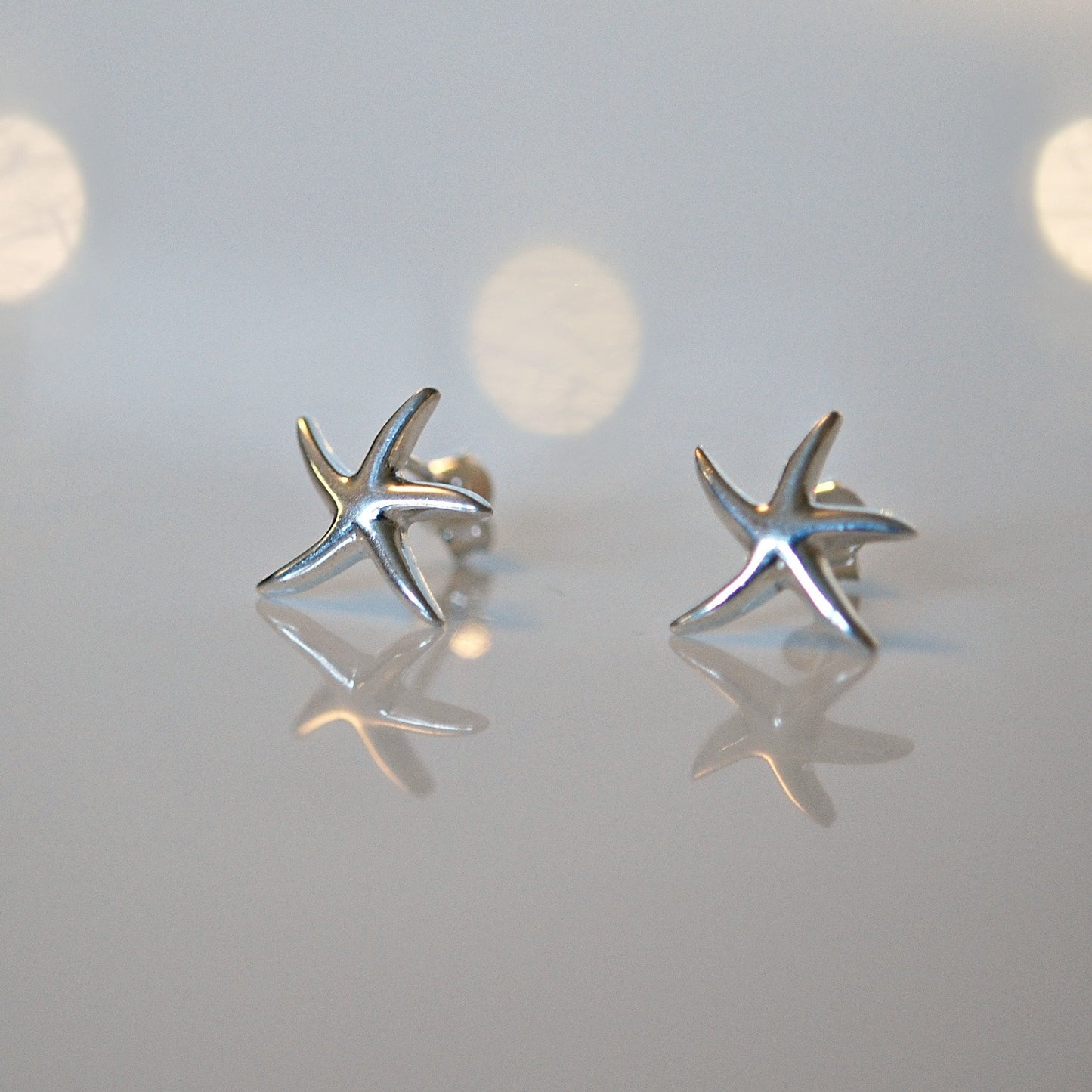 Star earrings, sterling silver star studs, silver starfish earrings, celestial earrings, vacation gift, nautical jewelry, sea star, beach