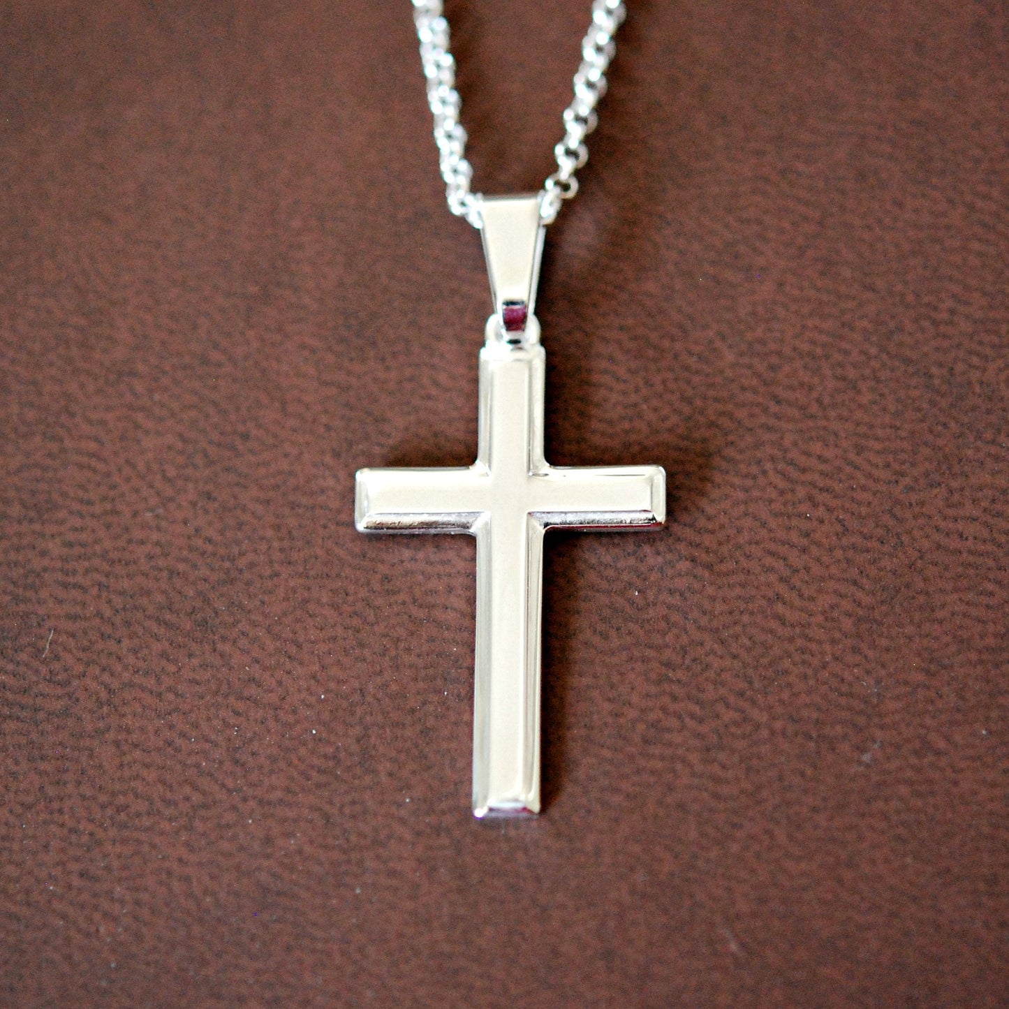 Silver edged cross necklace