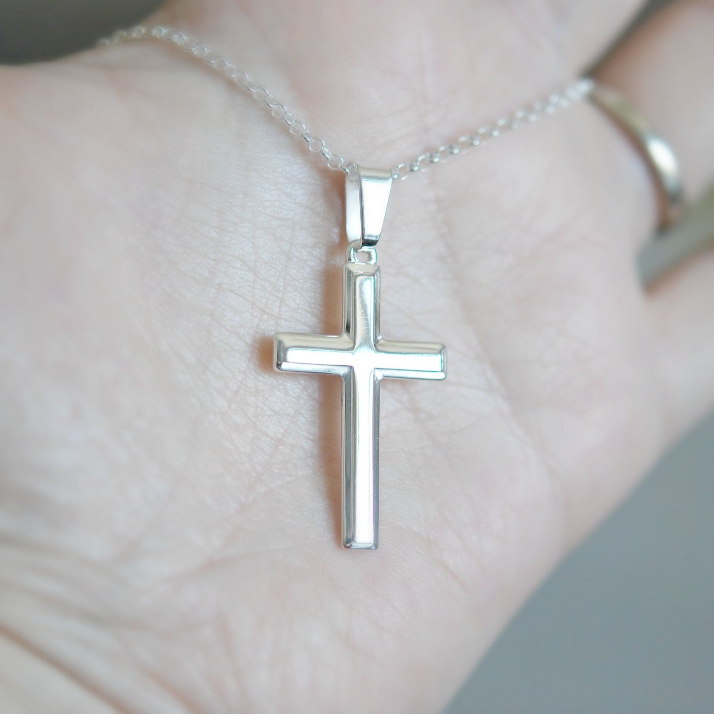 Silver edged cross necklace