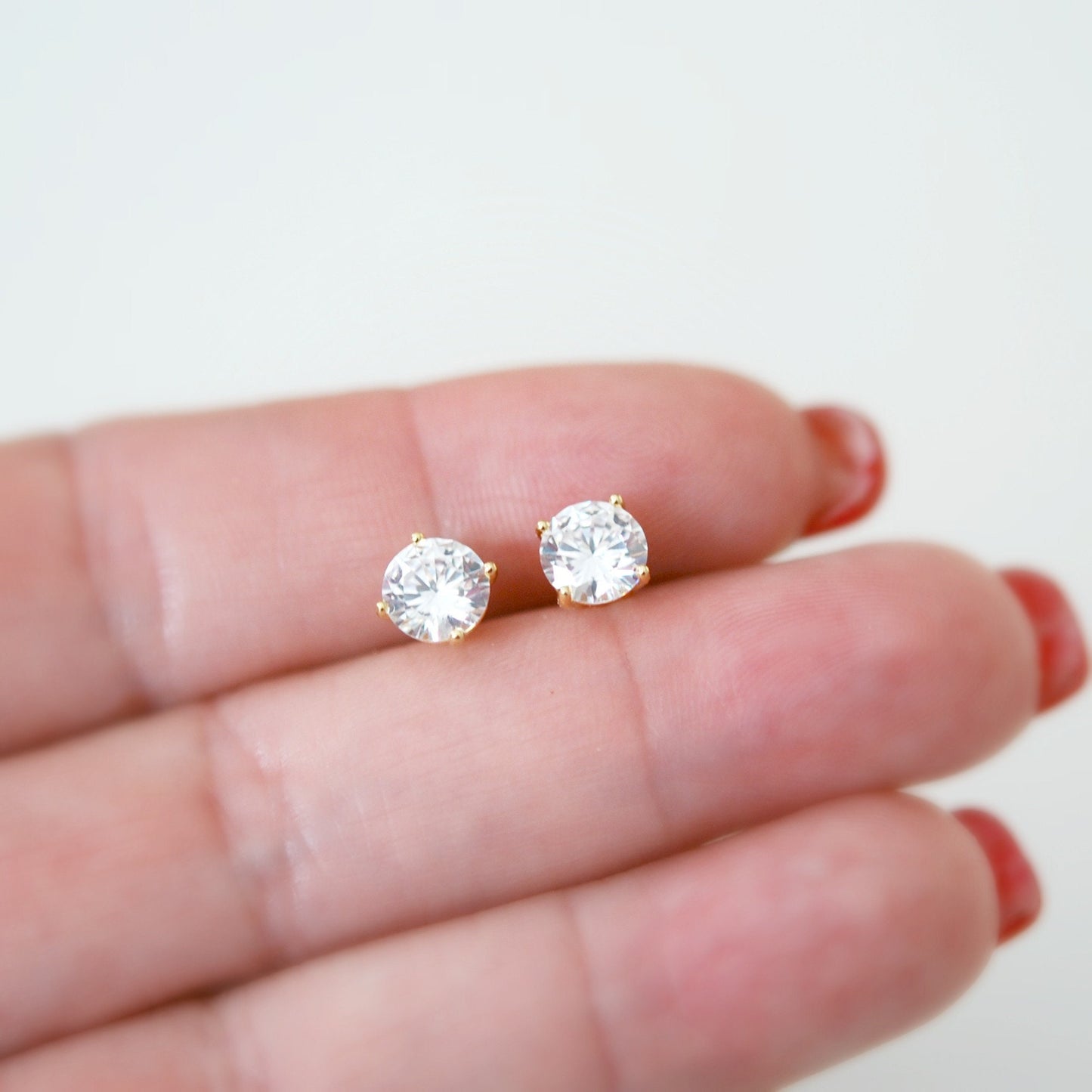 Minka gold cz stud earrings - round or square