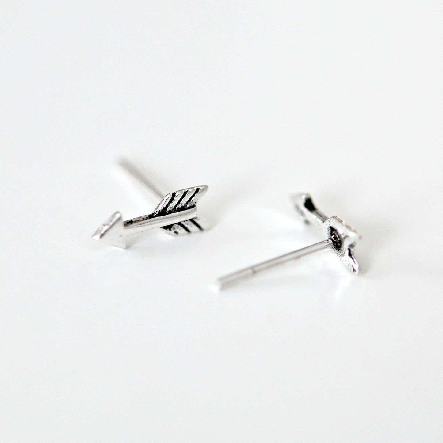 Arrow stud earrings