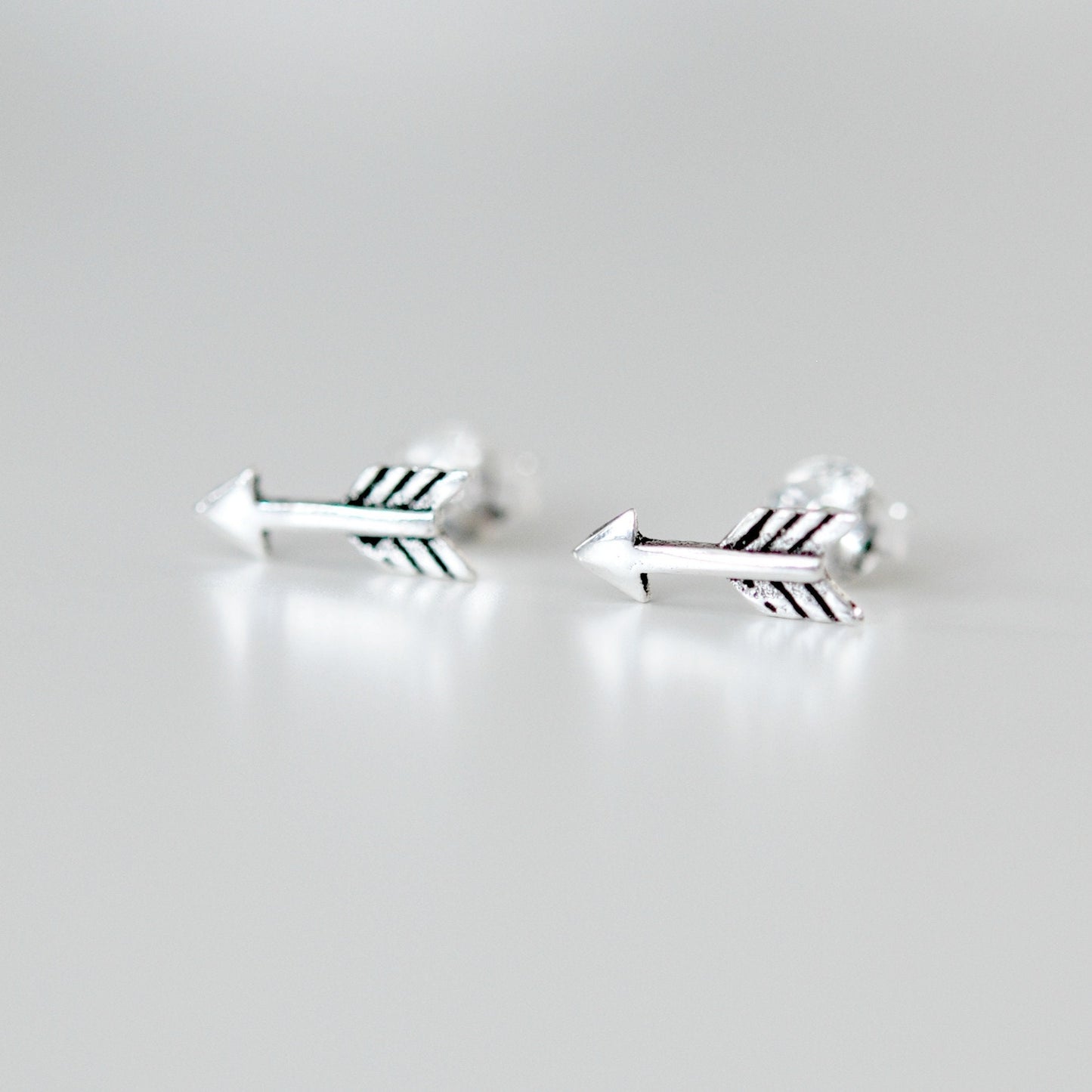 Arrow stud earrings