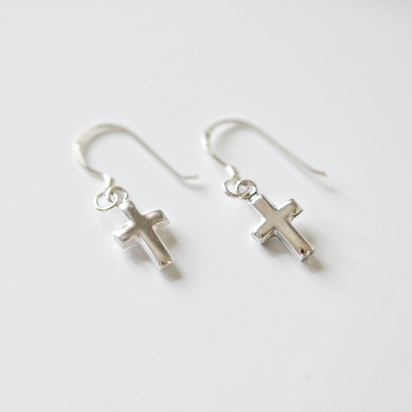 Tiny sterling silver cross earrings