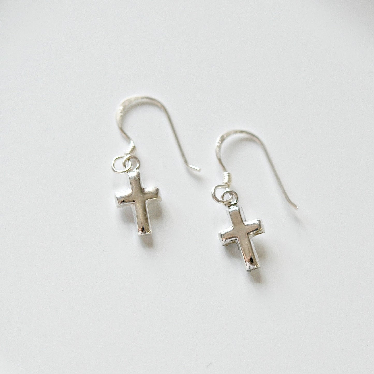 Tiny sterling silver cross earrings