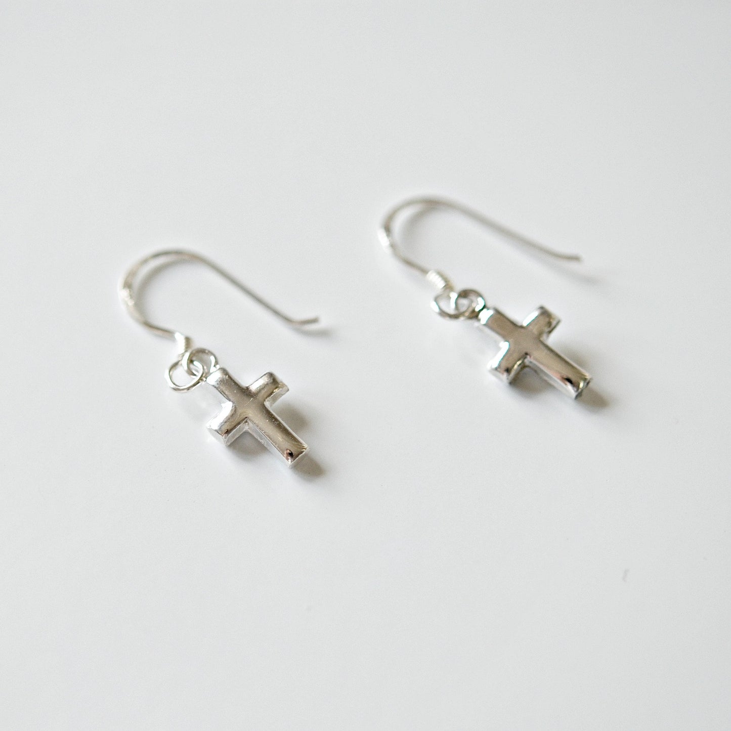 Tiny sterling silver cross earrings