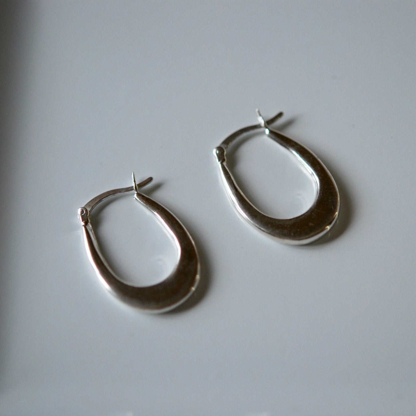 Cairo oval hoop earrings