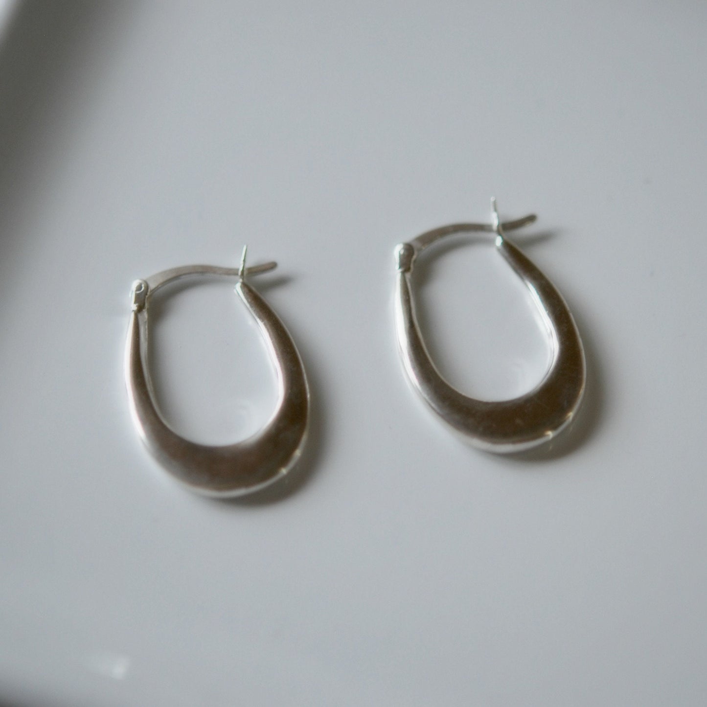 Cairo oval hoop earrings