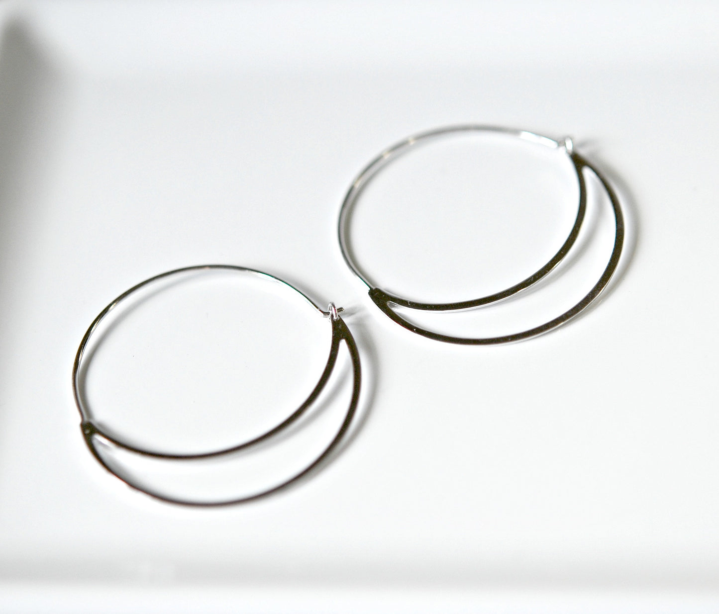 Asmara crescent hoop earrings