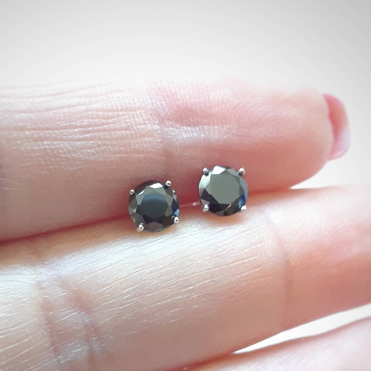 Minka round cz stud earrings - clear or black