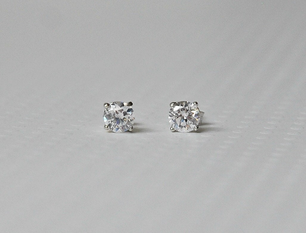 Minka round cz stud earrings - clear or black