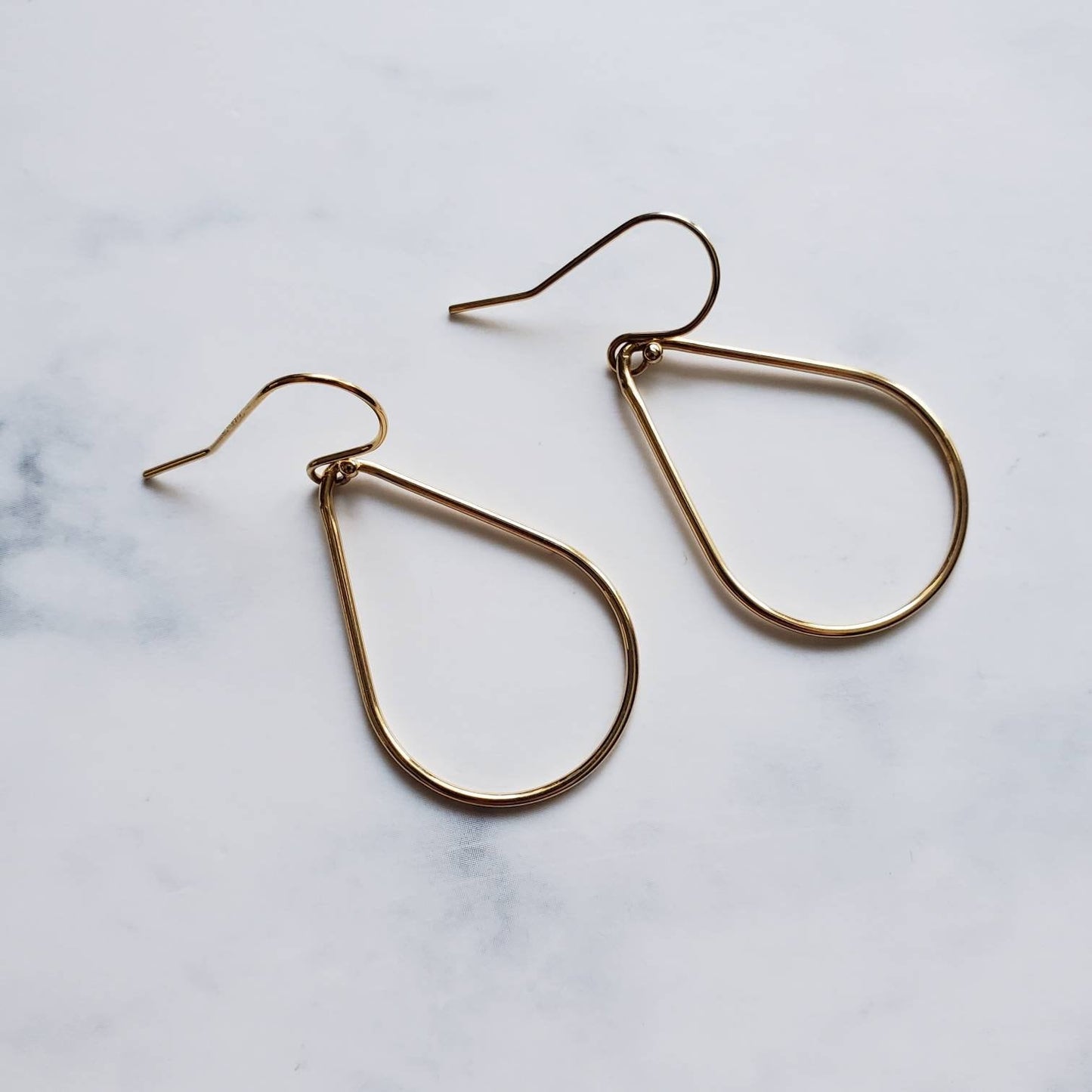 Aquarius gold teardrop earrings