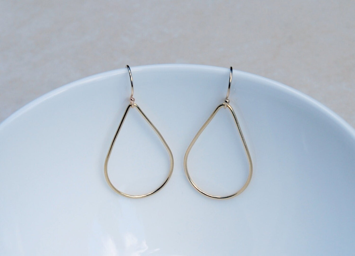 Aquarius gold teardrop earrings