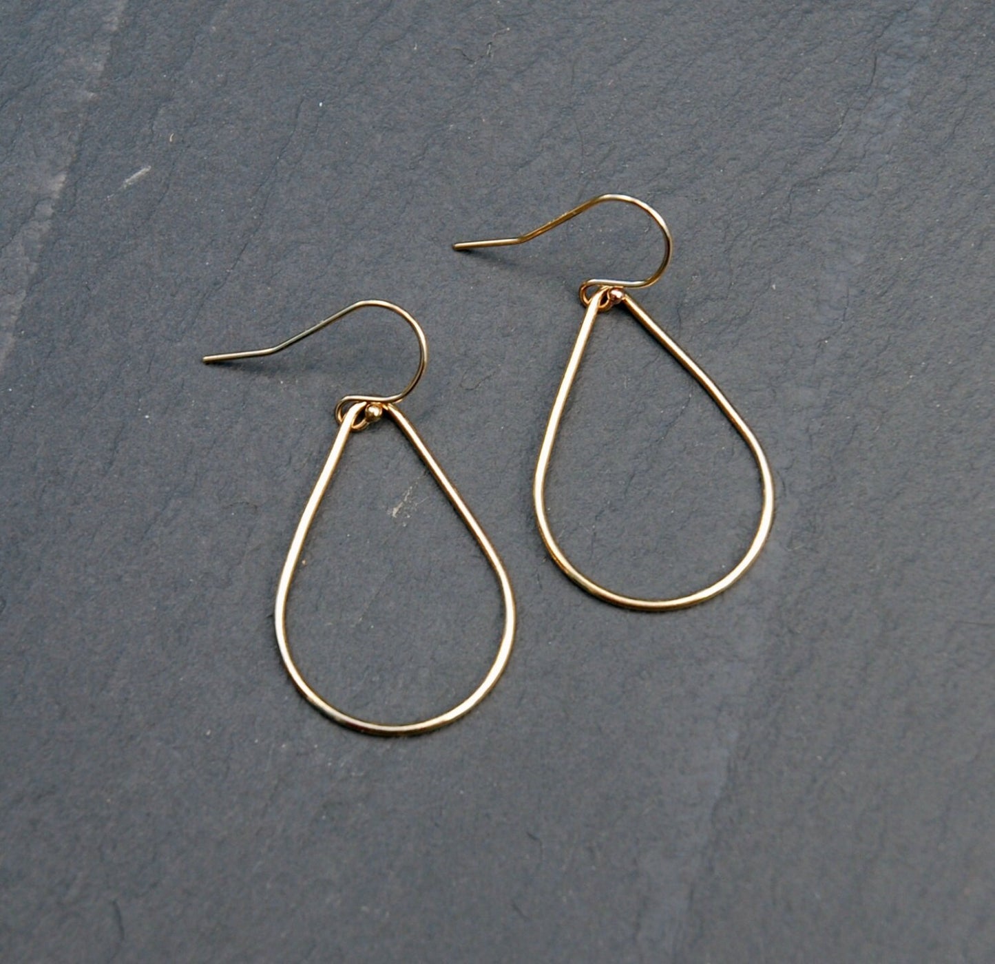 Aquarius gold teardrop earrings