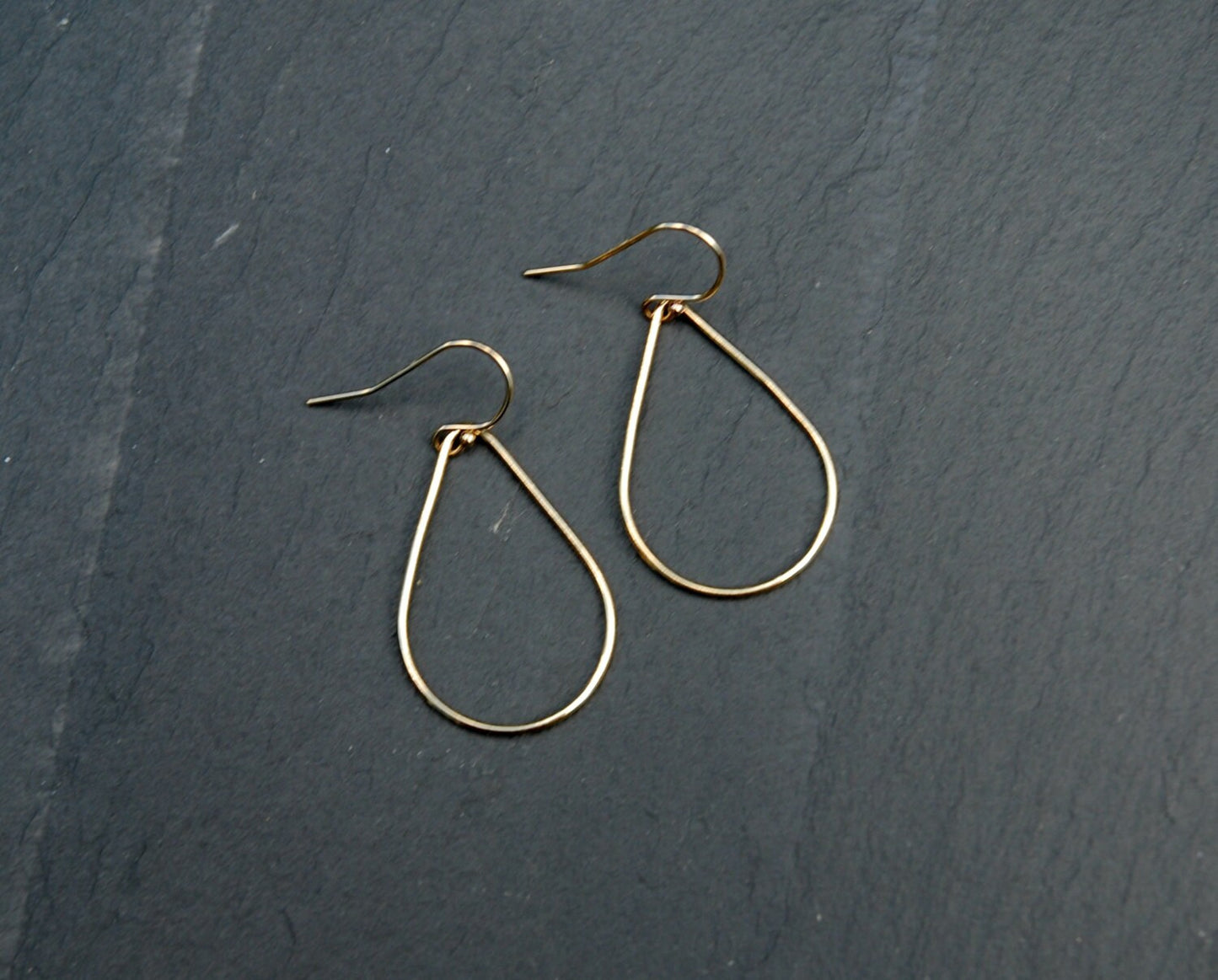 Aquarius gold teardrop earrings