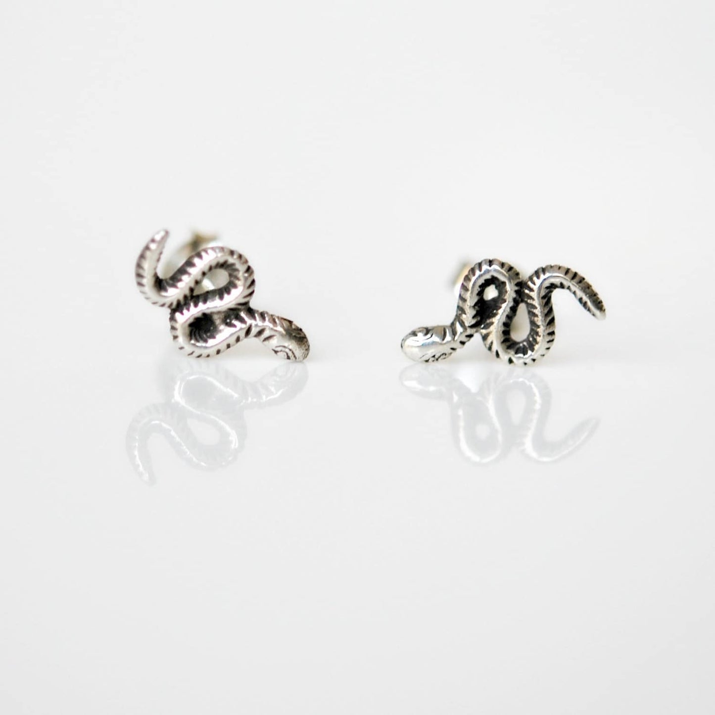 Snake stud earrings