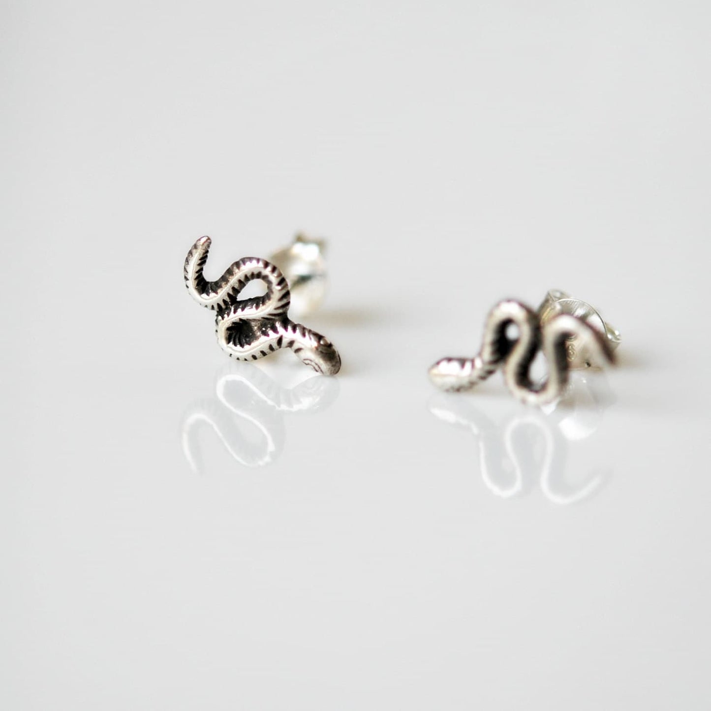 Snake stud earrings