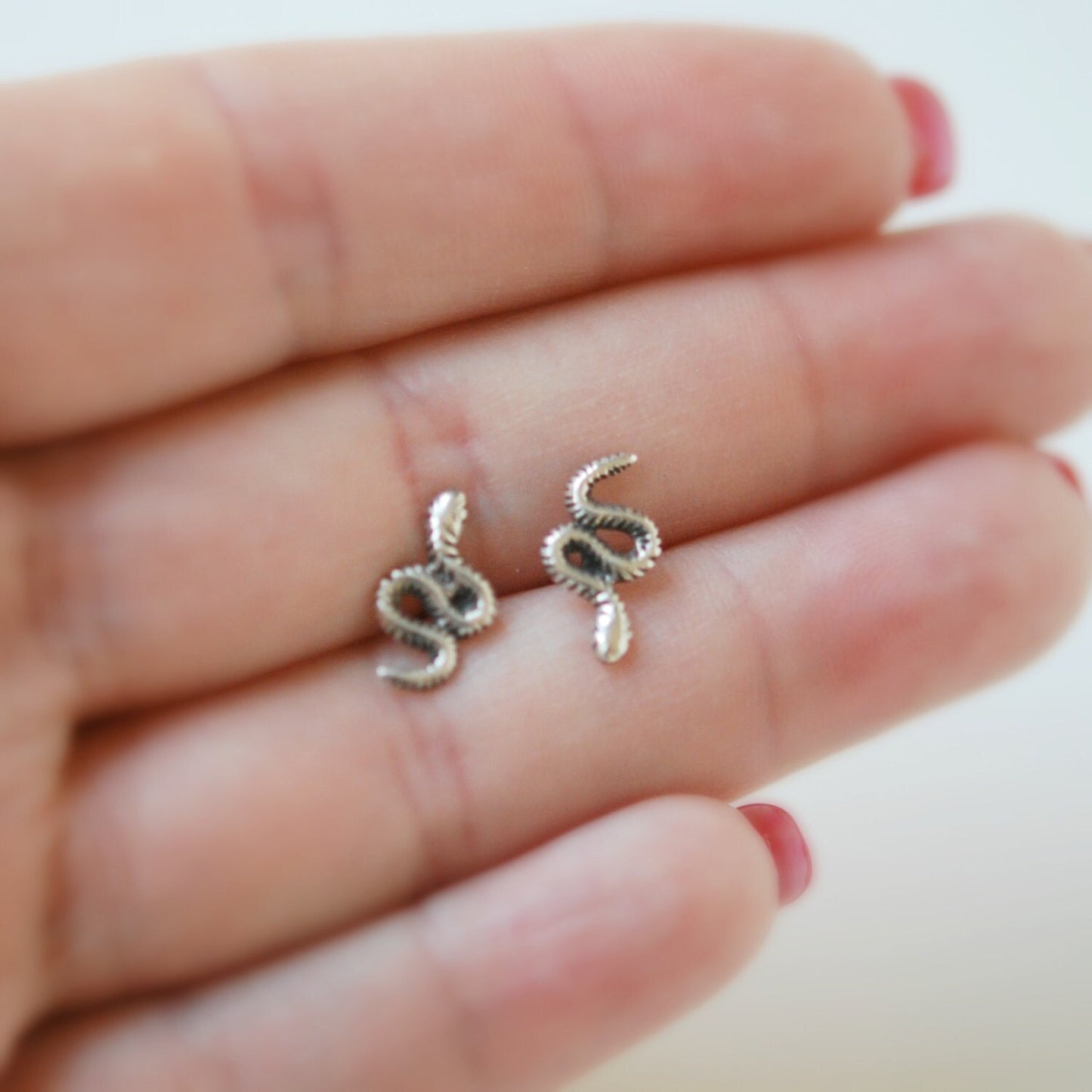 Snake stud earrings